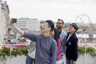 A group of founders taking a selfie together.